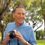 a East Ridge resident standing with his professional camera