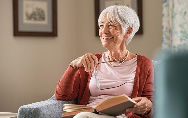 senior woman reading a book