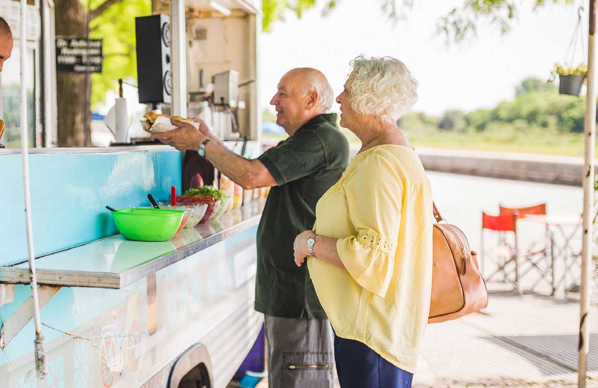 seniors ordering food at a food truck