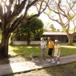 East Ridge at Cutler Bay senior residents walking their dog