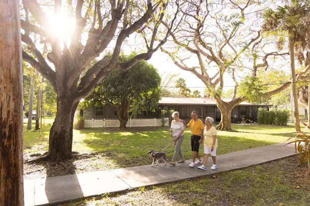 seniors walking their dog at East Ridge Assisted Living